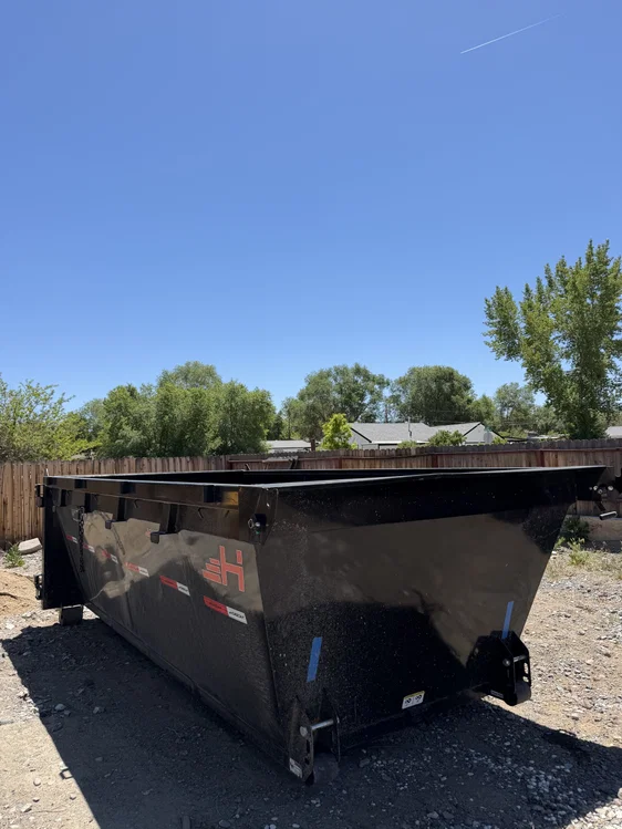15 yard Longhorn roll off dumpster at the yard